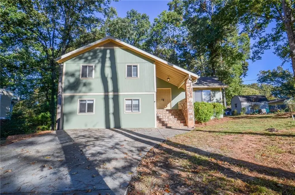 3173 Falconhurst Drive Sw, Lilburn, GA 30047 - Image #1