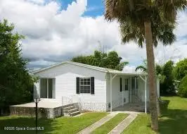 818 Thrush Circle, Barefoot Bay, FL 32976
