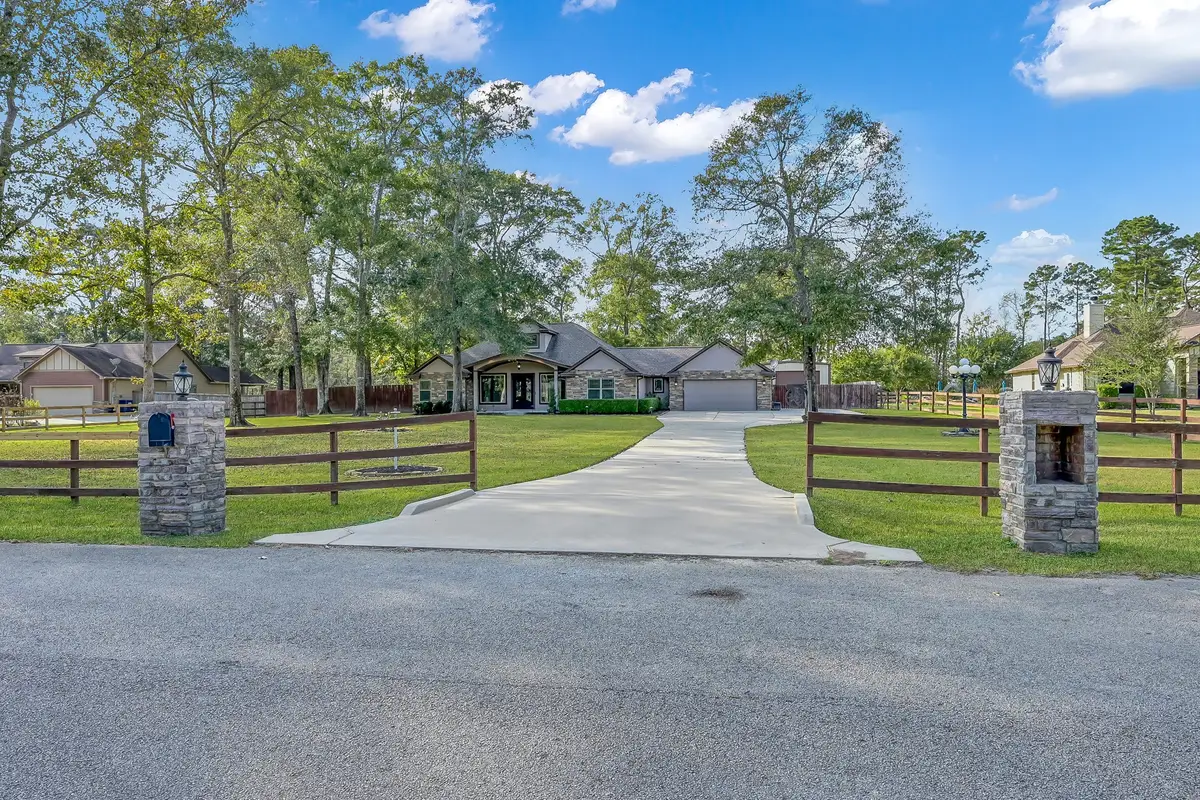 11486 Oak Springs Drive, Willis, TX 77378 - Image #1