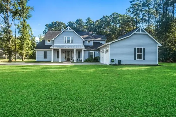 703 Lago Trace Drive, Huffman, TX 77336