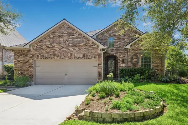2 Woodmoor Place, Magnolia, TX 77354