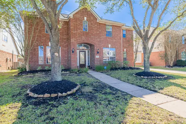 12815 Mossy Ledge Drive, Tomball, TX 77377