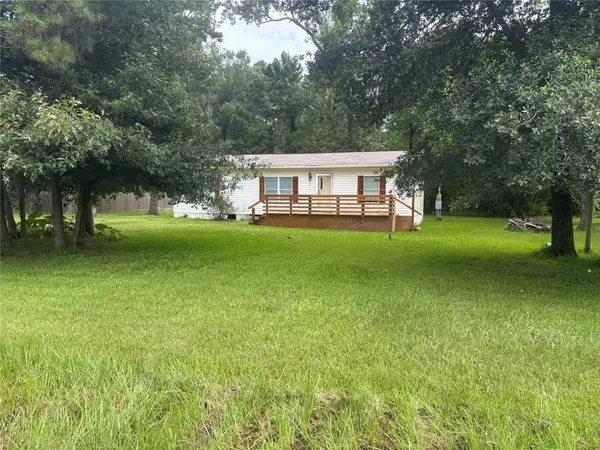 12011 Walraven Drive, Huffman, TX 77336