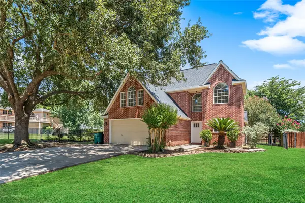 6979 Breezy Point, Willis, TX 77318