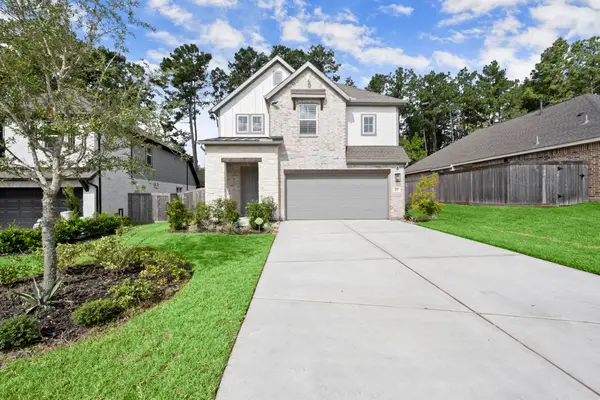 217 Woods Rose Court, Conroe, TX 77318