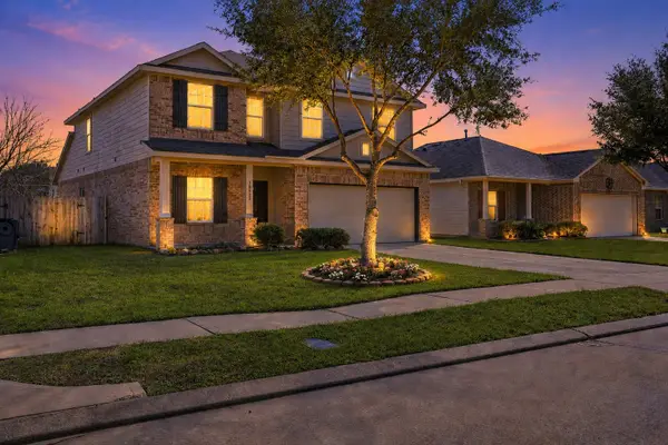 10922 Woodwind Shadows Drive, Cypress, TX 77433