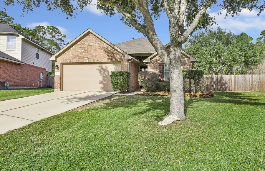 10303 Whisper Bluff Drive, Humble, TX 77396 - Image #2