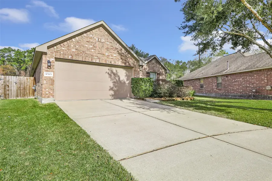 10303 Whisper Bluff Drive, Humble, TX 77396 - Image #3