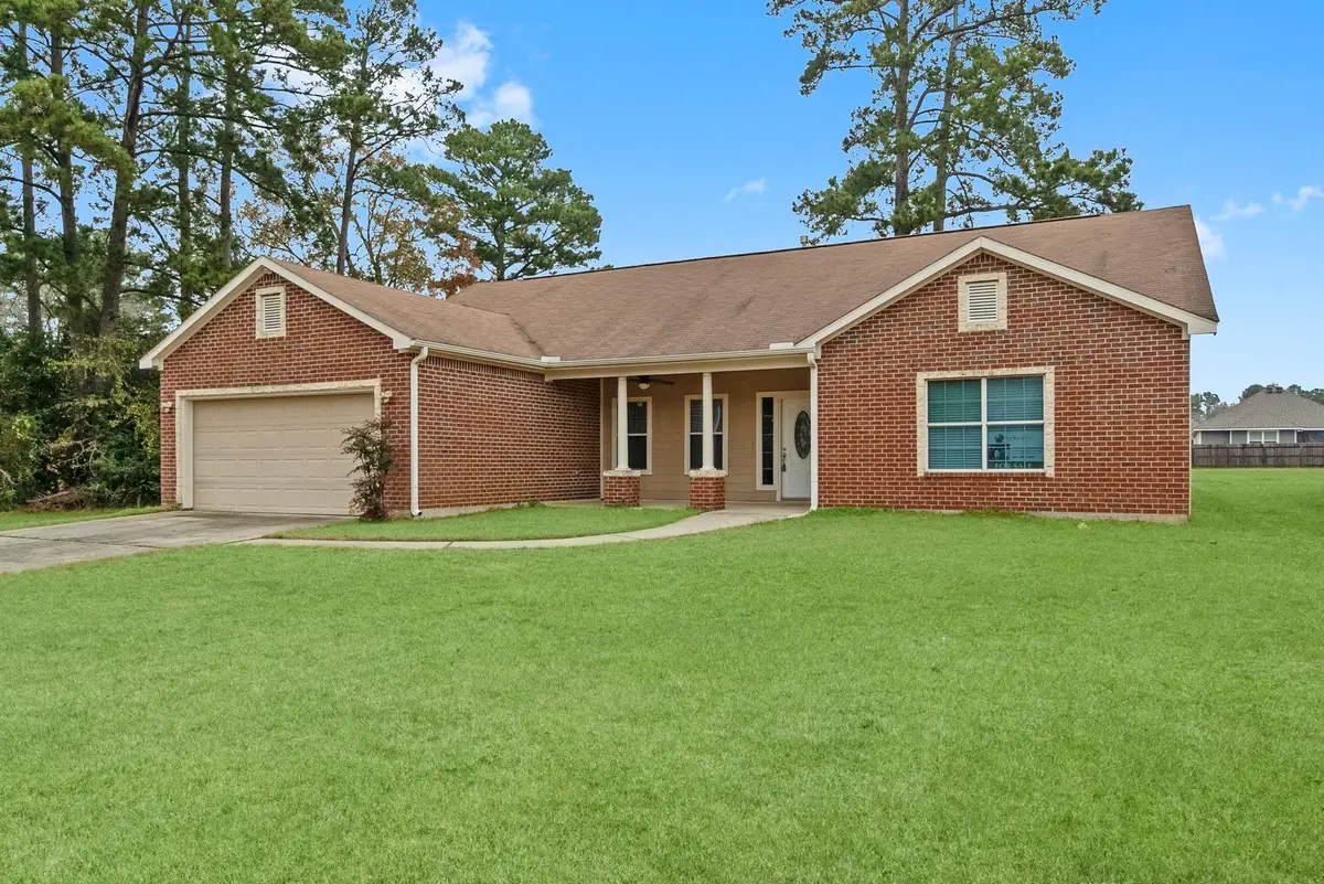 13003 Point Aquarius Boulevard, Willis, TX 77318 - Image #1