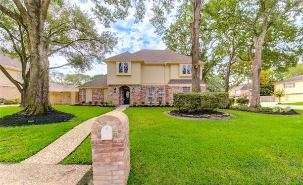 9115 Taidswood Drive, Spring, TX 77379