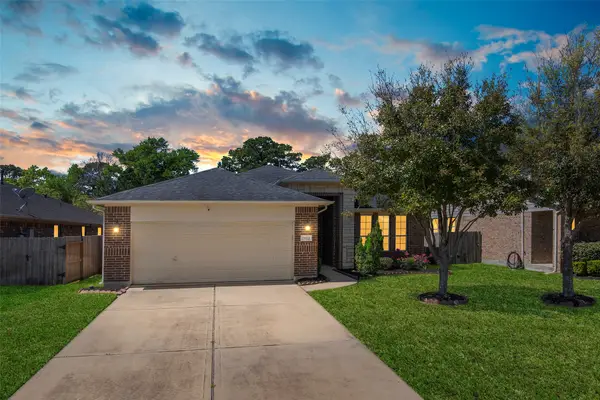 15623 Whisper Woods Drive, Cypress, TX 77429