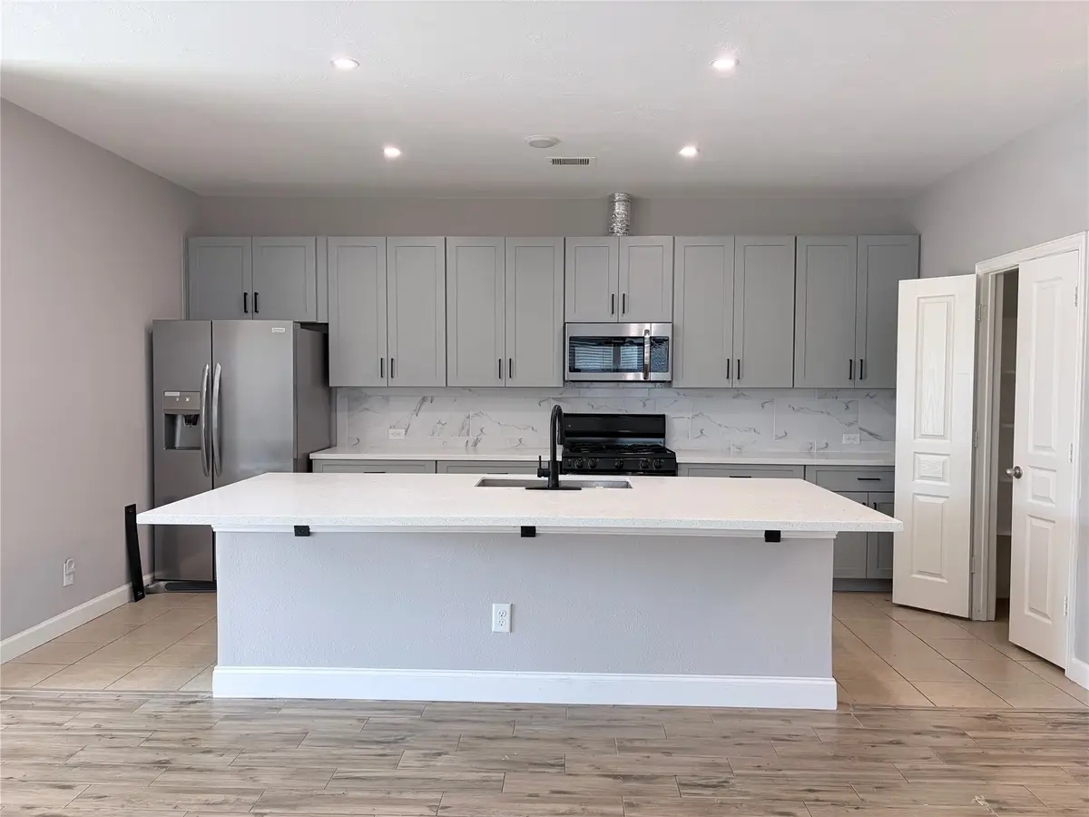 10910 Woodwind Shadows Drive, Cypress, TX 77433 - Image #1