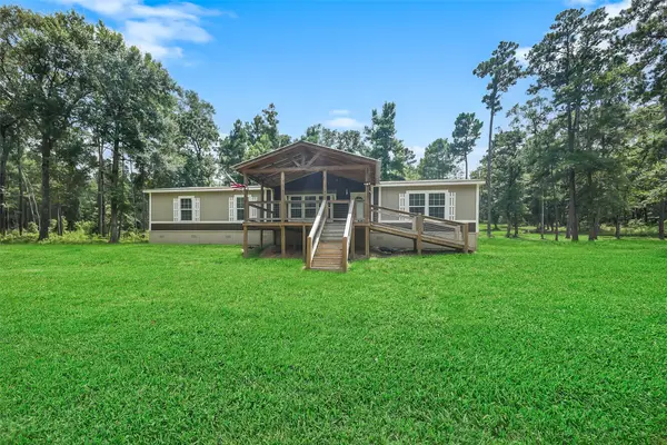 577 Winding River Road, Oakhurst, TX 77364