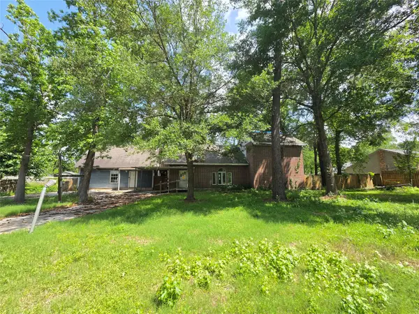 12222 Oak Hollow Lane, Pinehurst, TX 77362