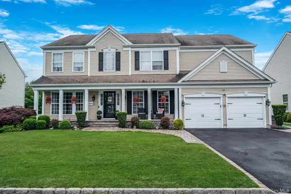 11 Woodstork Drive, Mount Sinai, NY 11766