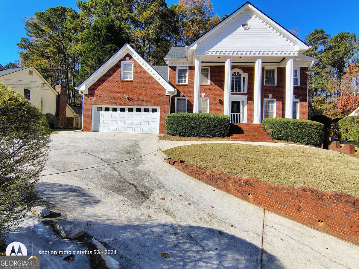 5121 Huntshire Lane Sw, Lilburn, GA 30047 - Image #1
