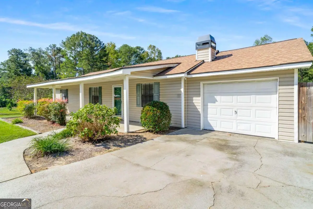 1141 Holly Hills Drive Sw, Lilburn, GA 30047 - Image #1