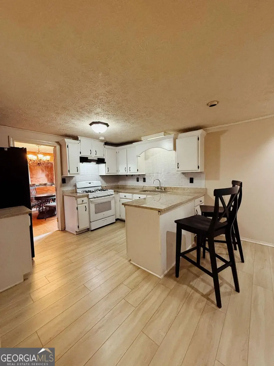 815 Sunfield Drive Nw, Lilburn, GA 30047 - Image #3