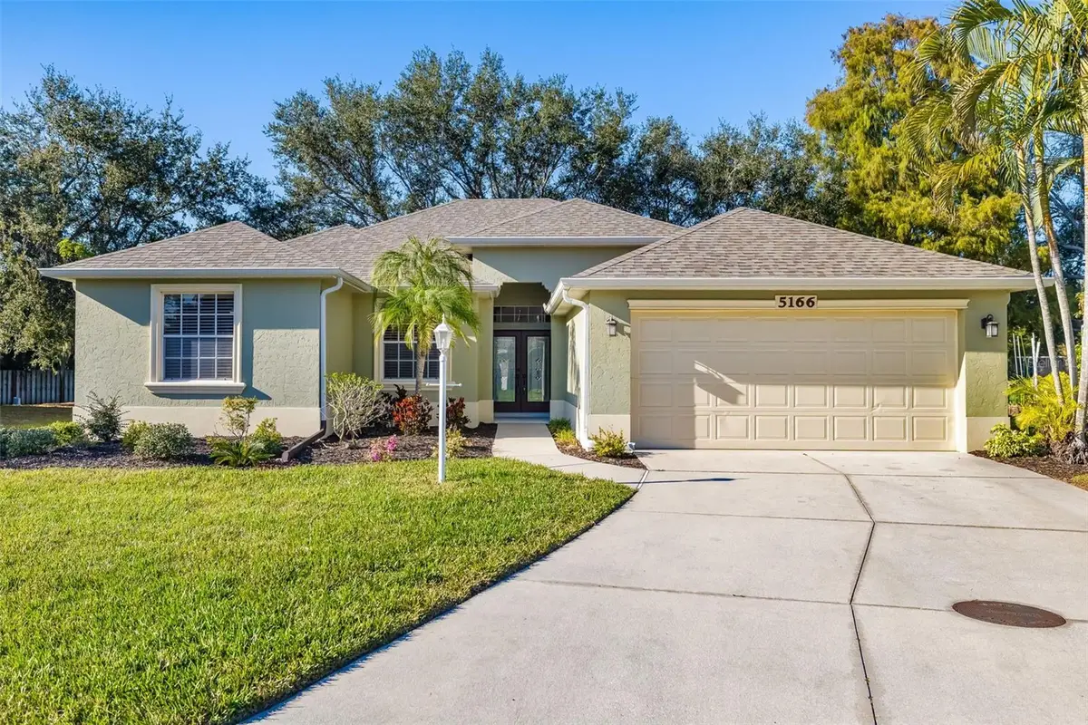 5166 Magnolia Pond Drive, Sarasota, FL 34233 - Image #1