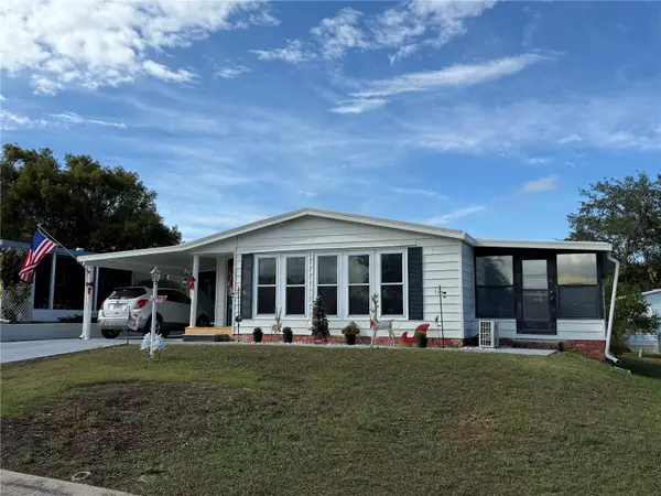 1612 Cog Hill Drive, LADY LAKE, FL 32159