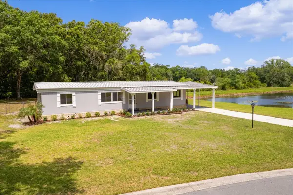 302 Ivanhoe Circle, LADY LAKE, FL 32159