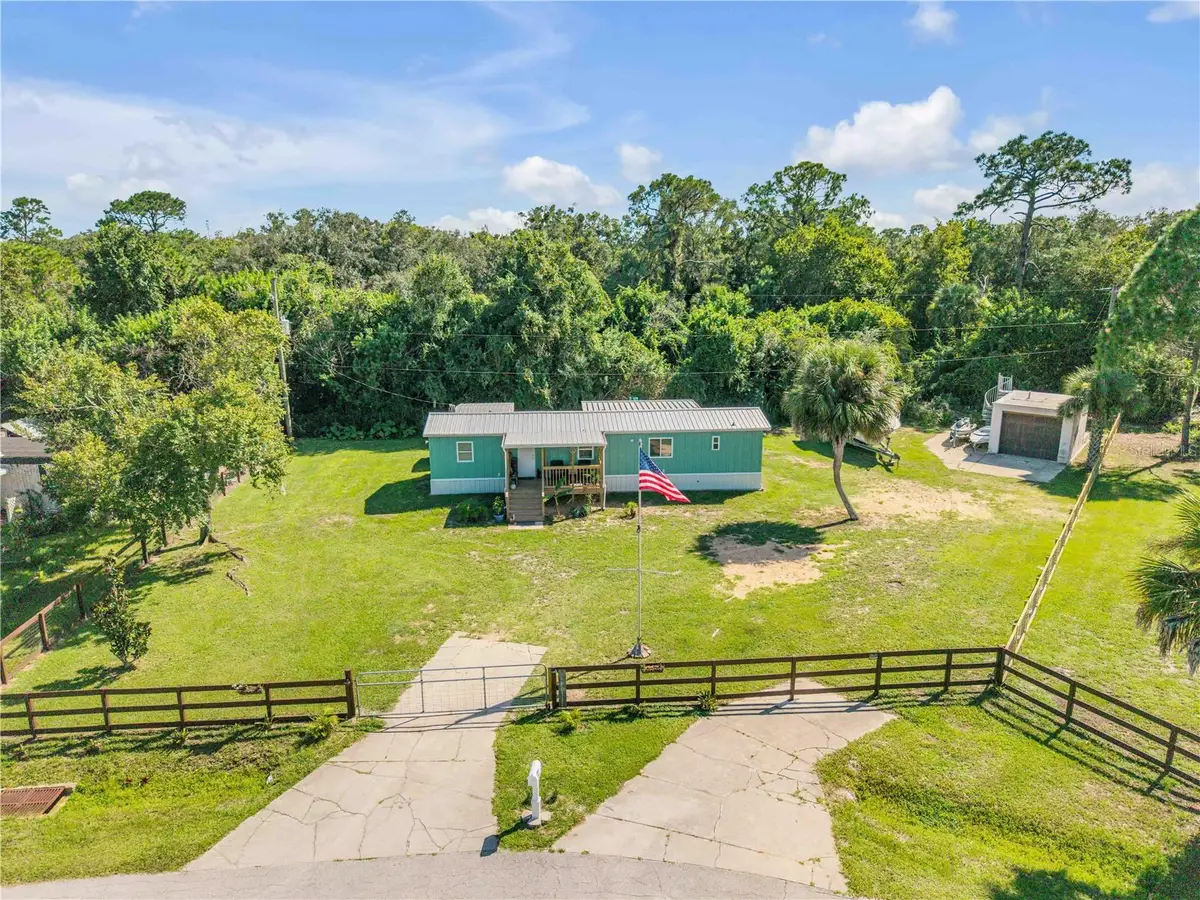 169 West Loop, Oak Hill, FL 32759 - #1