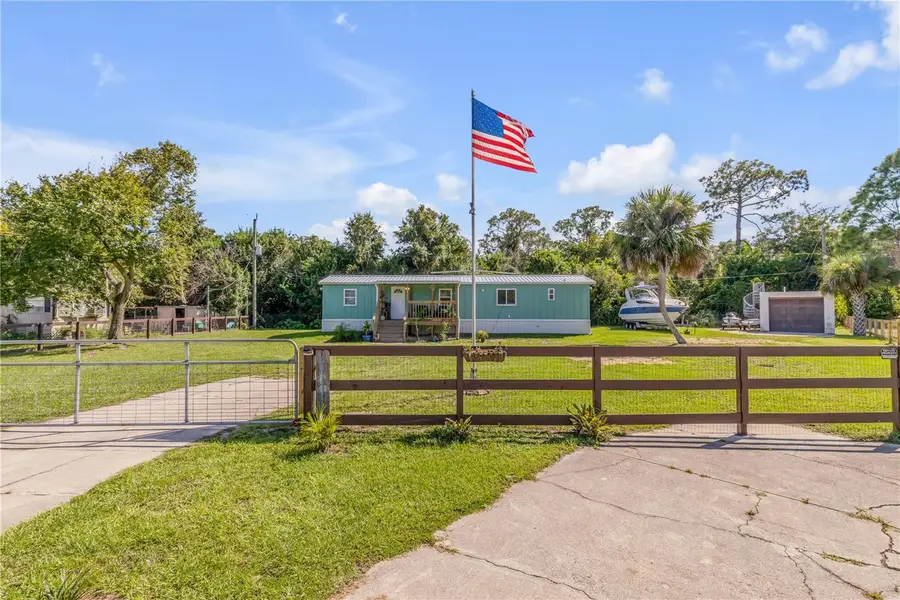 169 West Loop, Oak Hill, FL 32759 - #2