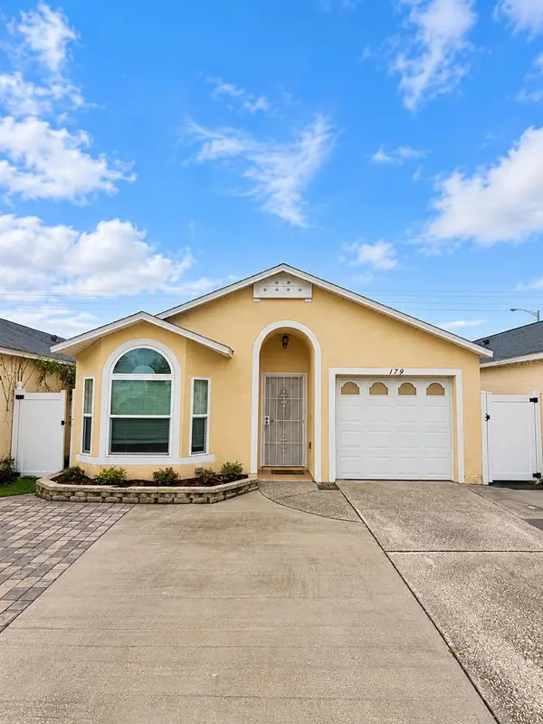 179 Dahlia Village Circle #63, ORLANDO, FL 32807