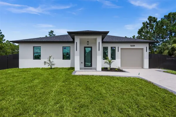 1039 Bassinger Avenue S, LEHIGH ACRES, FL 33974