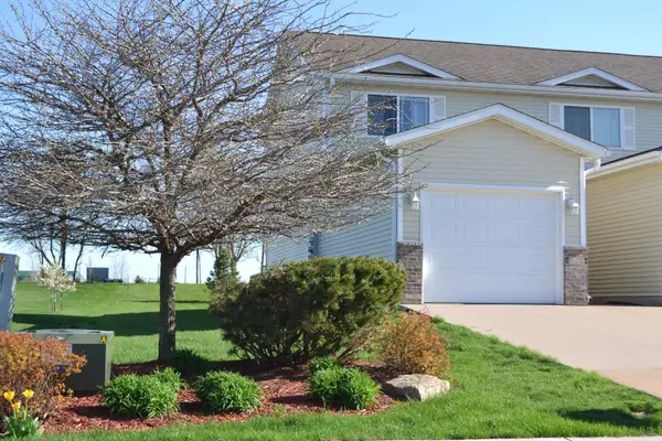 722 Prairie Meadow Drive, Blue Grass, IA 52726