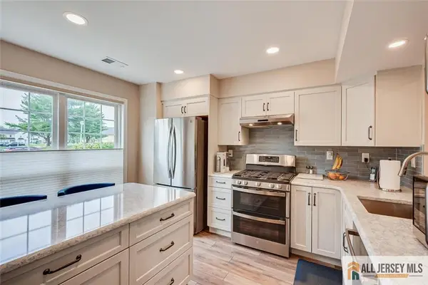 -254 Teasdale Place, Morganville, NJ 07751