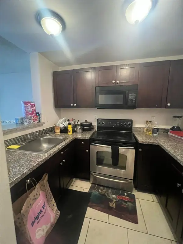 482 NW 165th St Road #A203, Miami, FL 33169