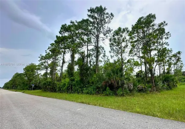 1247 Rake E Street, Lehigh Acres, FL 33974
