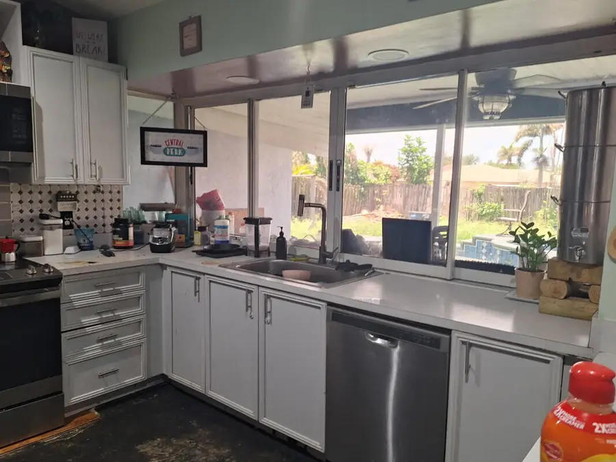 3310 SW Martin Street, Port Saint Lucie, FL 34953 - #3