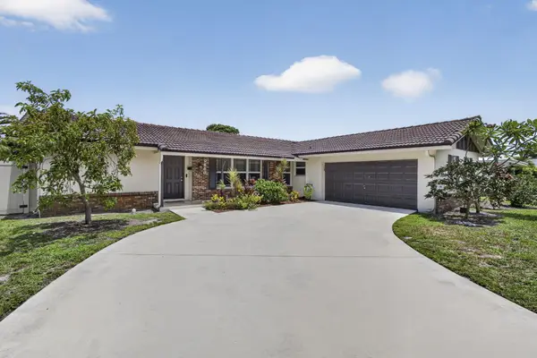 9860 Honeysuckle Avenue, Palm Beach Gardens, FL 33410