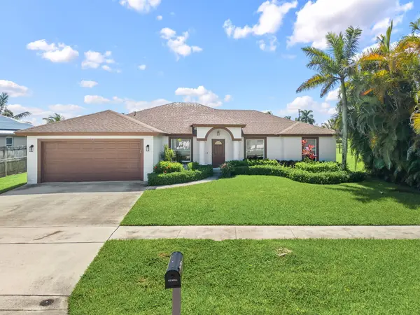 111 Meadow Woode Drive, Royal Palm Beach, FL 33411