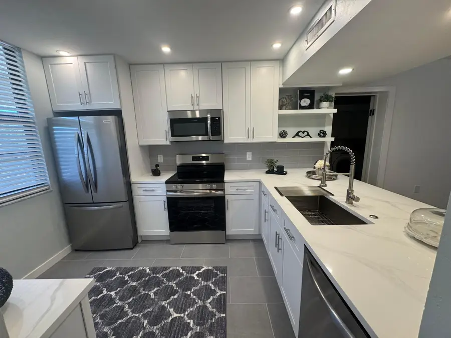 3710 Whitehall Drive #404, West Palm Beach, FL 33401 - #3