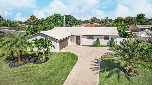 1881 Caribbean Road W, Lake Clarke Shores, FL 33406