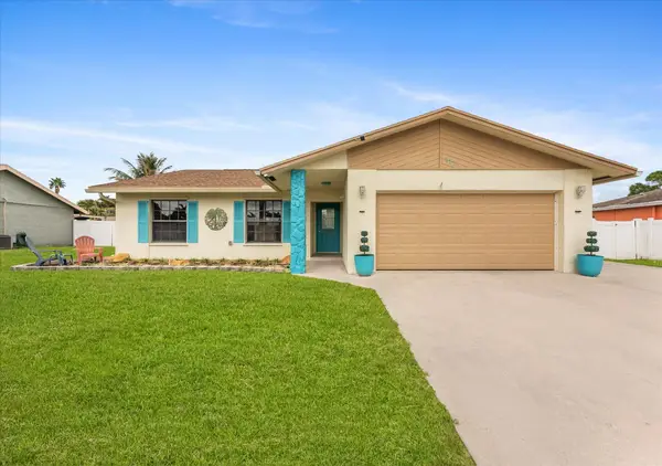 111 Madrid Street, Royal Palm Beach, FL 33411