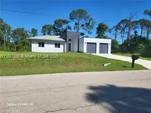521 Frank Jewett Ave S, Lehigh Acres, FL 33974