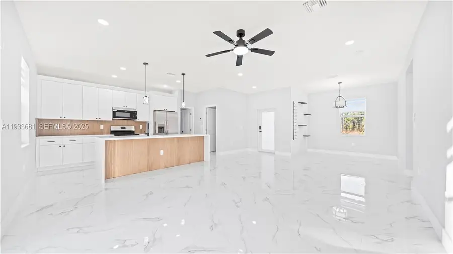 311 Mangonia Ave, Lehigh Acres, FL 33974 - #3