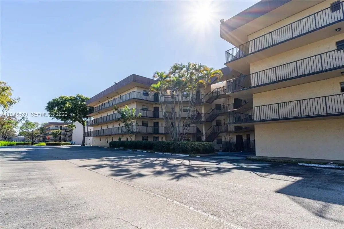 6855 W Broward Blvd #409, Plantation, FL 33317 - Image #1