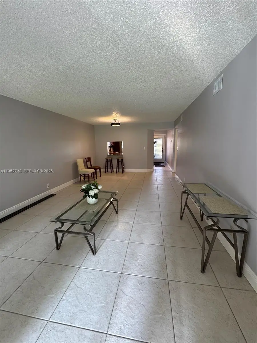 6095 N Sabal Palm Blvd #104, Tamarac, FL 33319 - Image #2