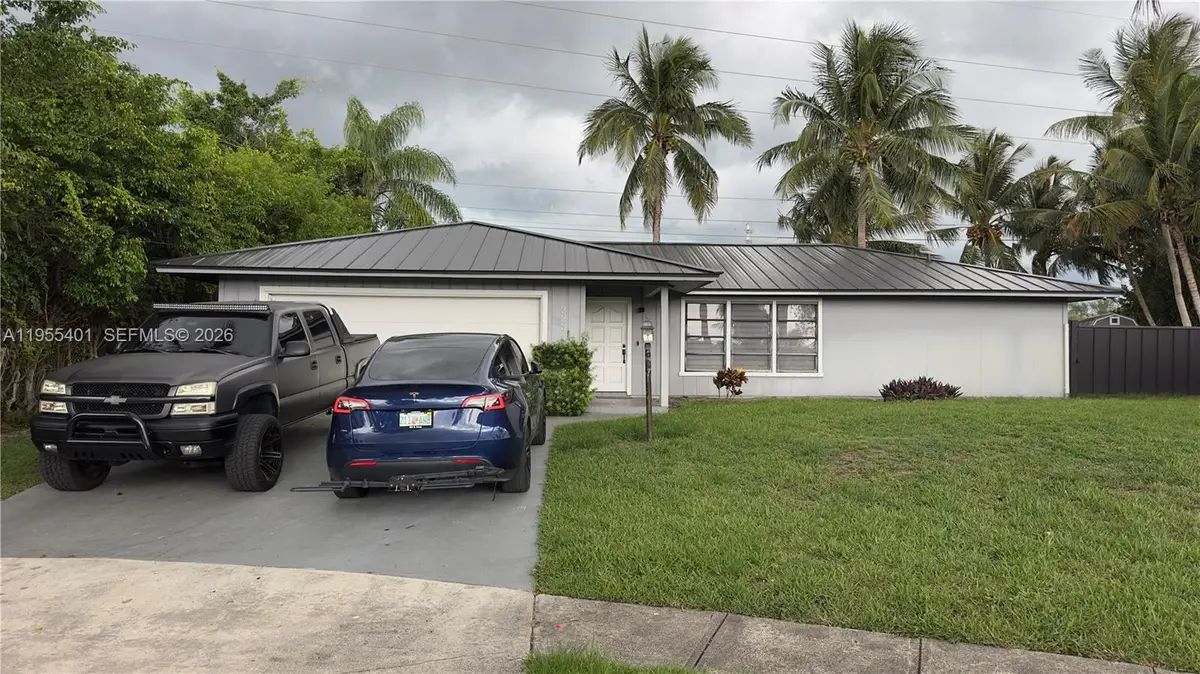 323 W Canterbury Dr W, Riviera Beach, FL 33407 - Image #1