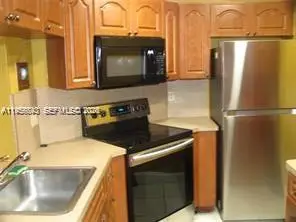 900 NE 209th Ter #104-31, Miami, FL 33179 - Image #1