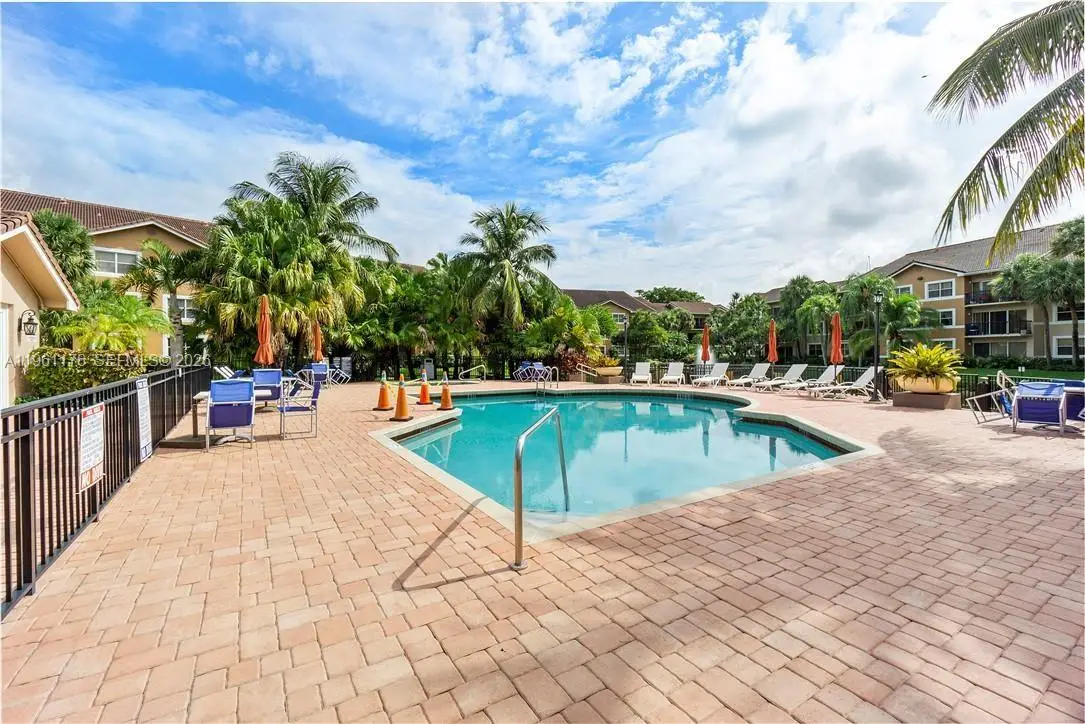 9055 Wiles Rd #103, Coral Springs, FL 33067 - Image #1