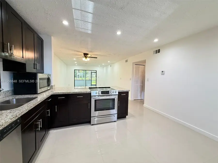 6095 N Sabal Palm Blvd #103, Tamarac, FL 33319 - #2