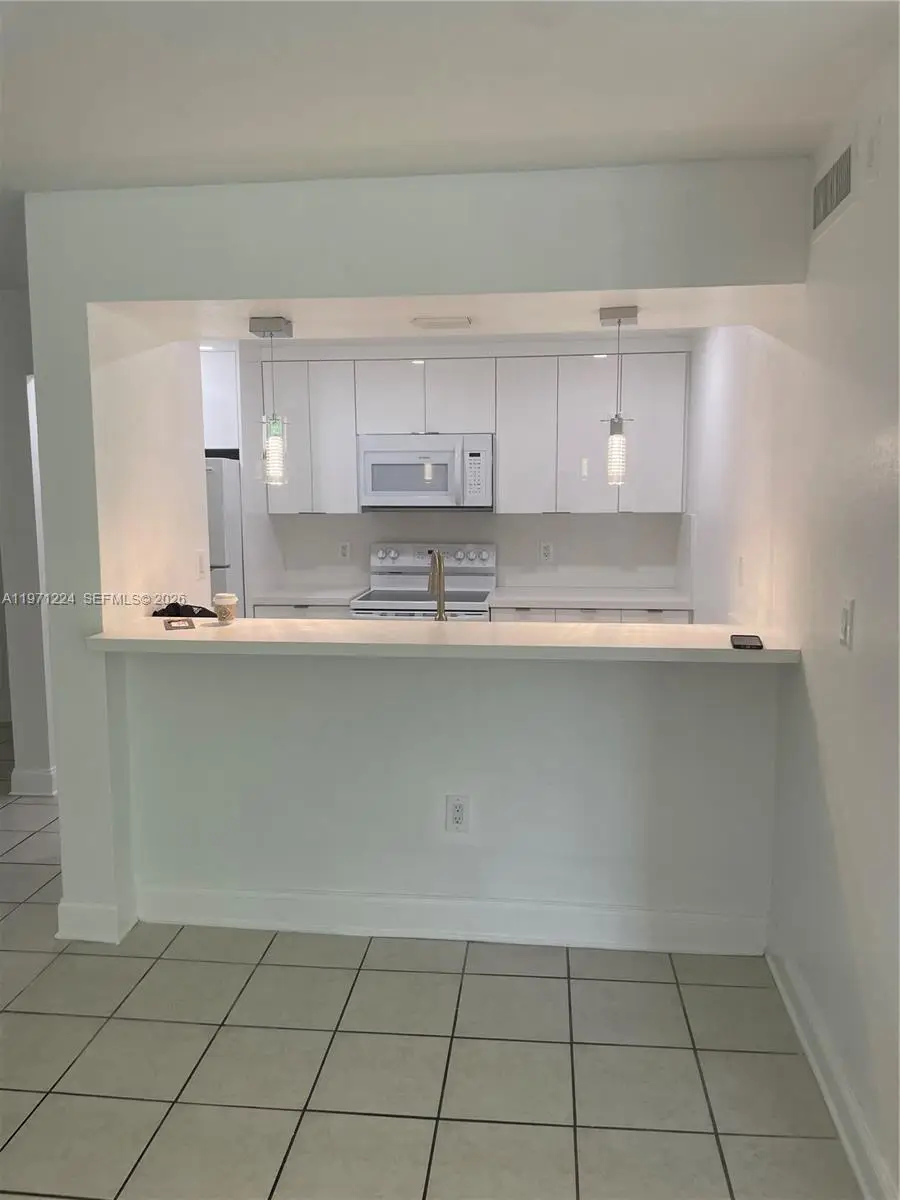 7165 NW 186th St #A104, Hialeah, FL 33015 - #2
