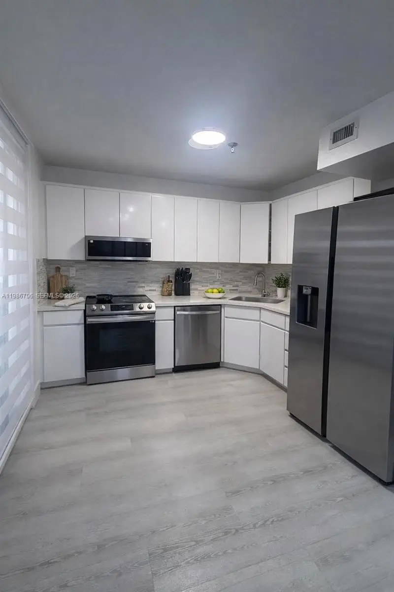 671 NE 195th St #219-E, Miami, FL 33179 - #1