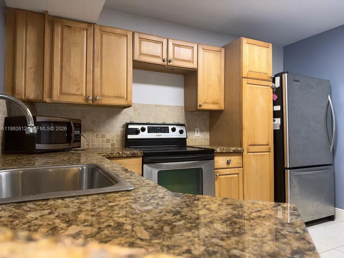 8901 Wiles Rd #103, Coral Springs, FL 33067 - #1